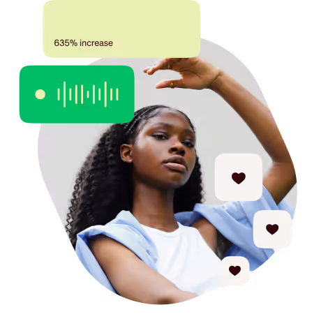 a girl poses holding her hand above her head