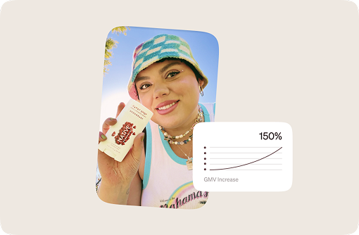 A woman holding a box of chocolates.
