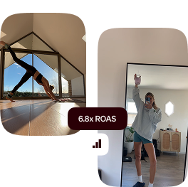 A woman taking a selfie in front of a mirror.