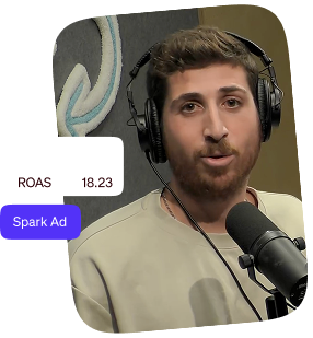Man speaking into a podcast microphone beside a Spark Ad metric showing an 18.23 ROAS.