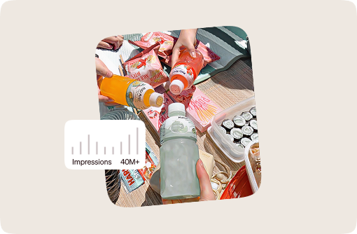 Hands holding colorful Mogu Mogu drinks beside a performance graphic showing over 40 million impressions.