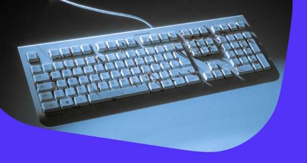 A computer keyboard with a blue background.