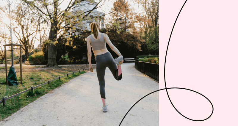 A woman is running on a path with a pink background.