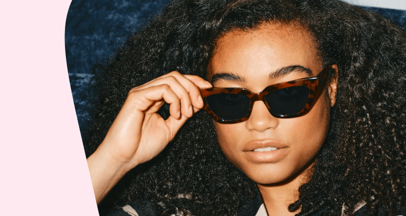 Person writing in note book