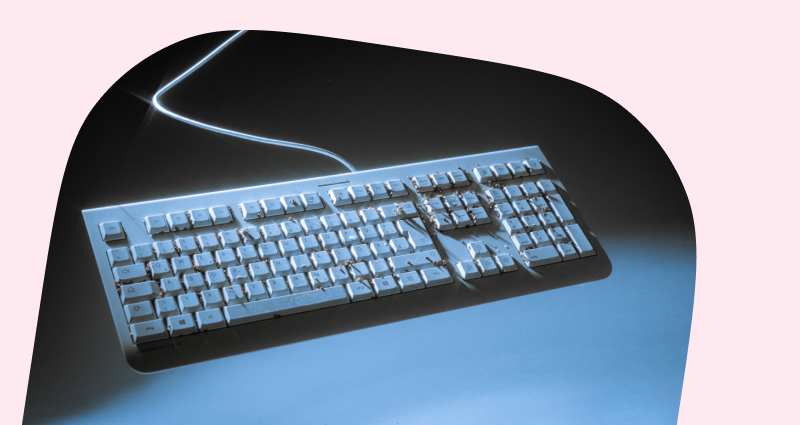 A computer keyboard with a blue background.