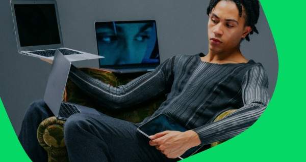 Person writing in note book