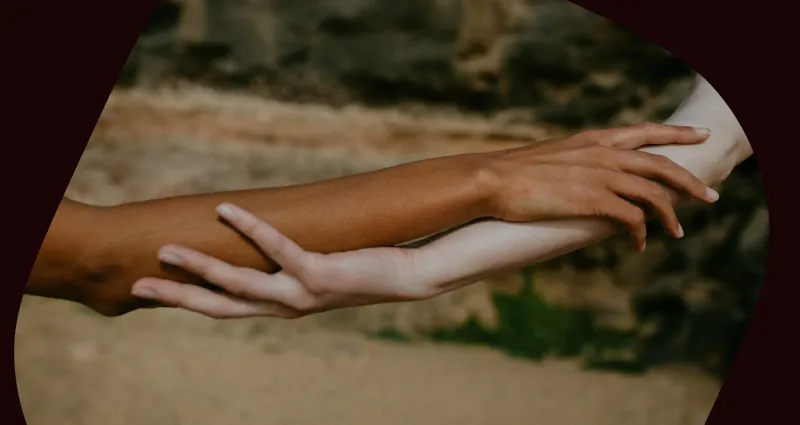 A man and woman are holding hands.