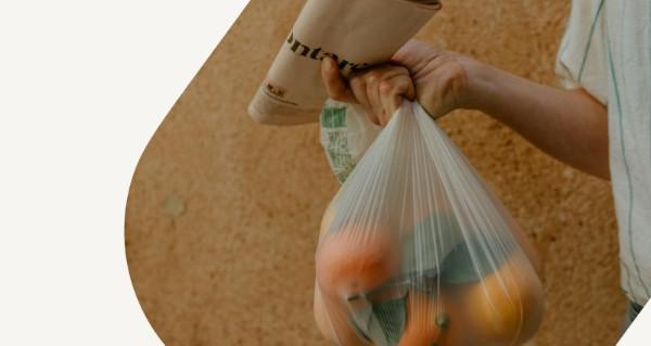 Person writing in note book