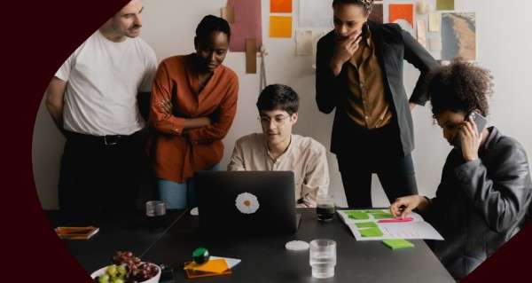 Person writing in note book