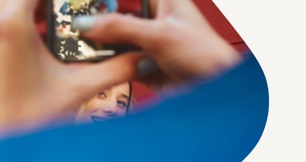 Person writing in note book