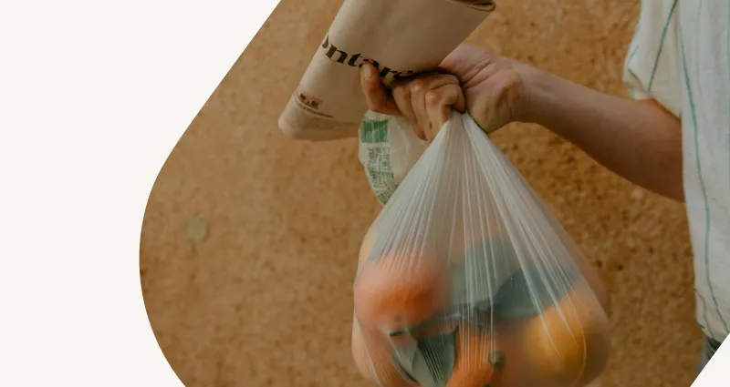 Person writing in note book