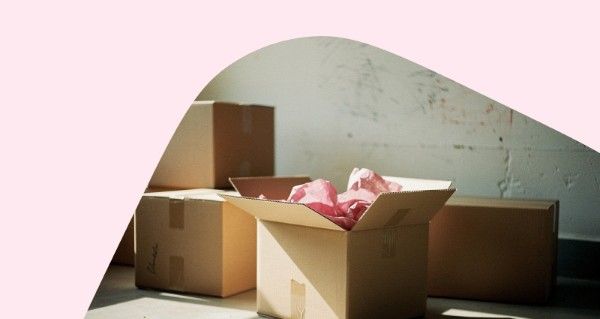 Person writing in note book