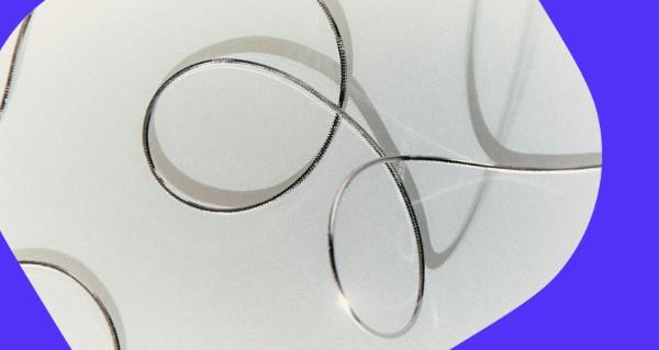 Person writing in note book