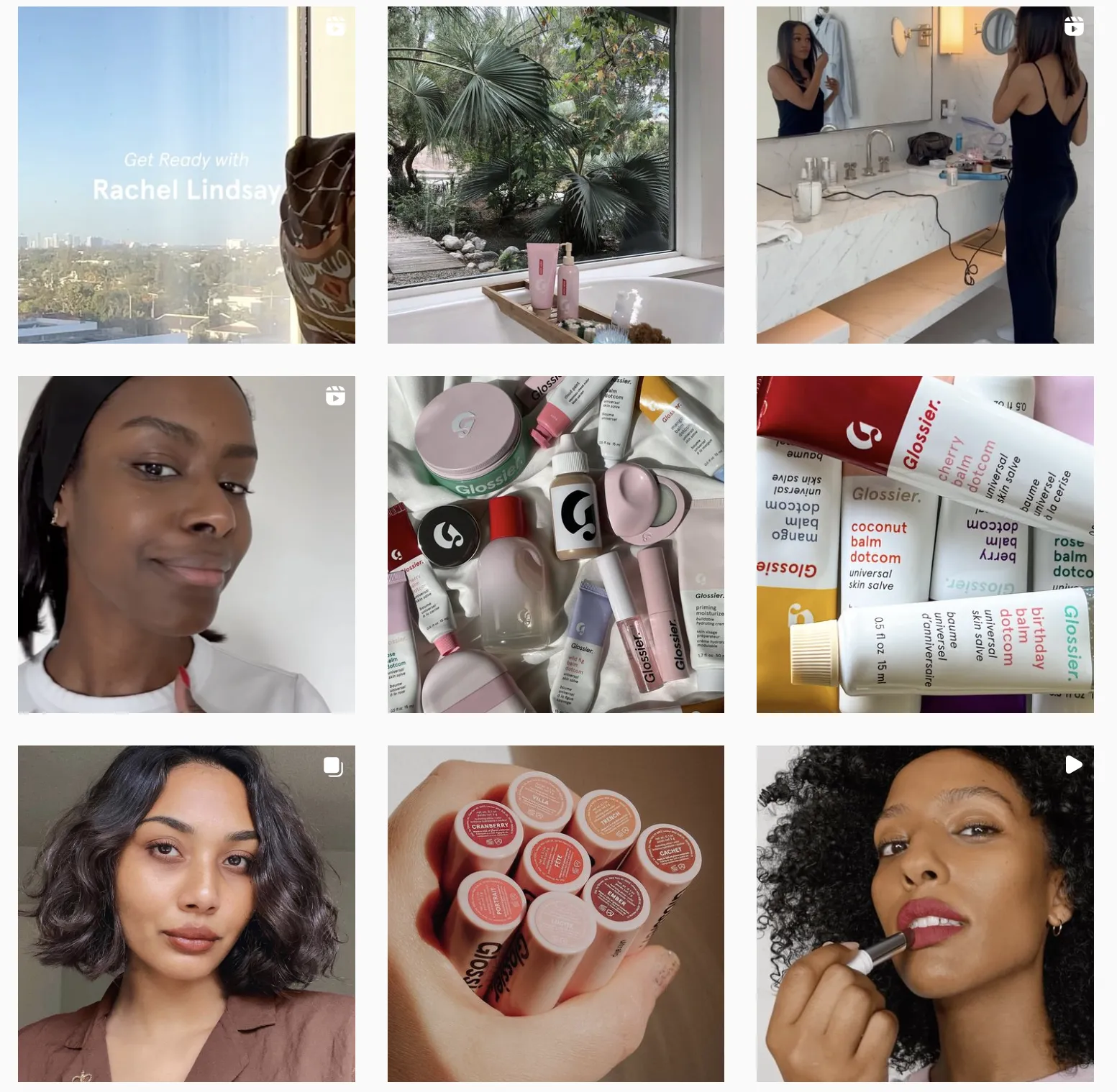 Instagram profile grid showcasing Glossier beauty products and user-generated content, including skincare routines, makeup tutorials, product flat lays, lip balms, and creators demonstrating Glossier cosmetics in everyday lifestyle settings.
