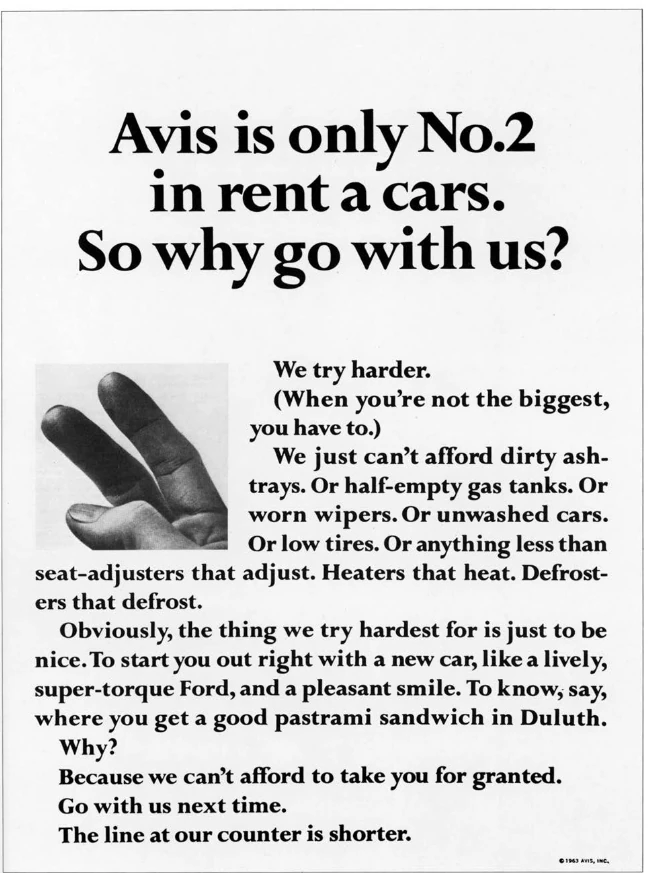 Avis print ad from 1963 headed "Avis is only No.2 in rent a cars. So why go with us?" with a photo of two raised fingers and copy that begins "We try harder"