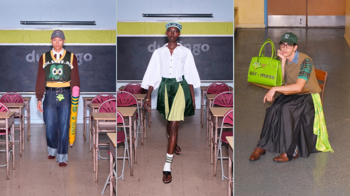 Three models in a classroom styled in Duolingo's Phonetic Collection, with a vest and a green bag printed with phonetic spellings such as "air-mess".