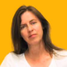Woman with long brown hair wearing a white top, against a yellow background.