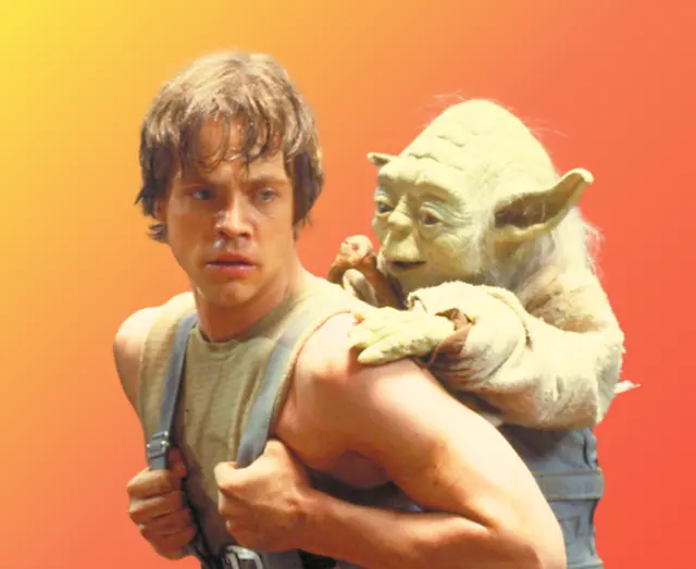 Young man carrying a small green alien creature with large ears on his back against an orange gradient background.