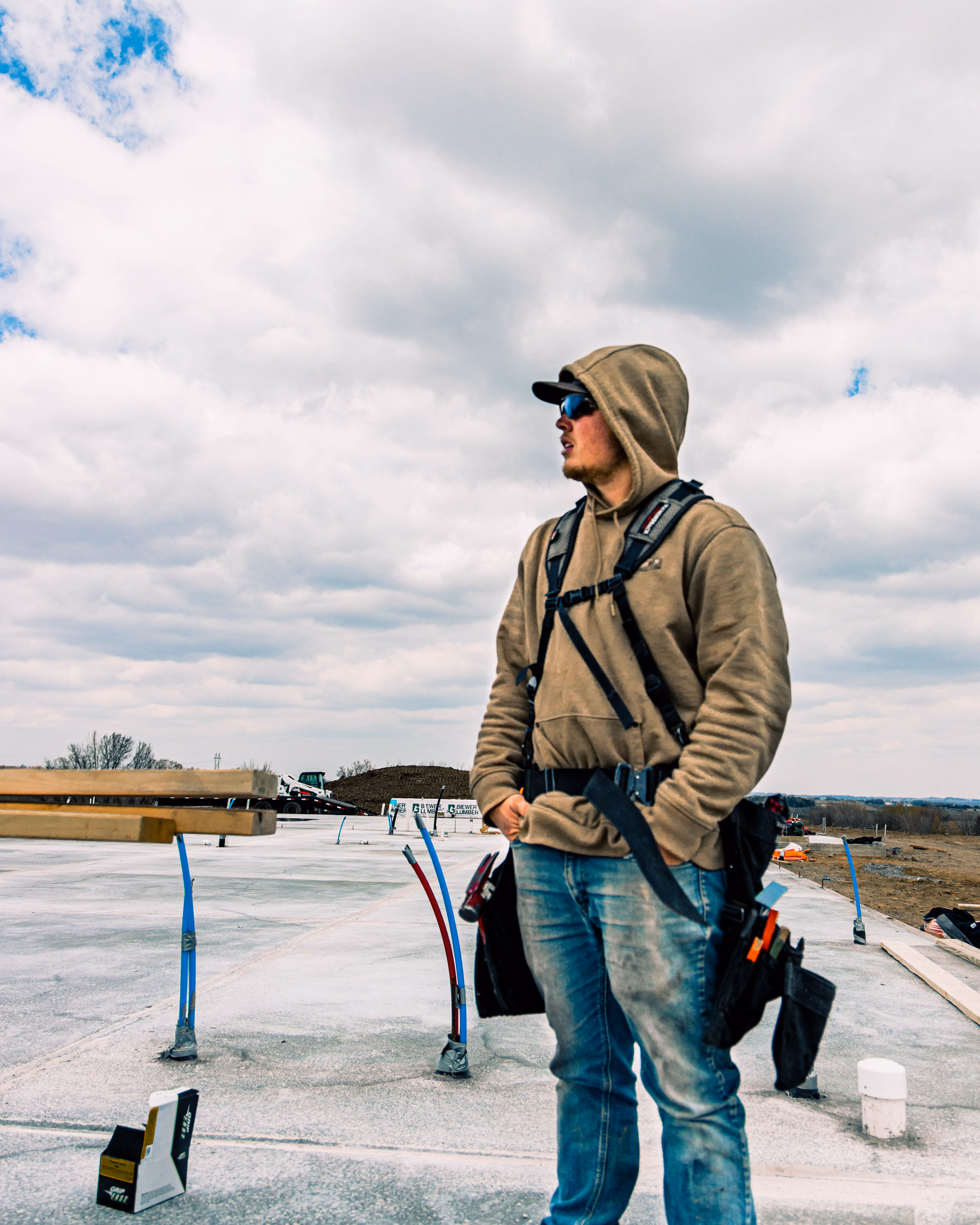 Construction worker looking over a new commercial jobsite in Sioux Falls, SD.