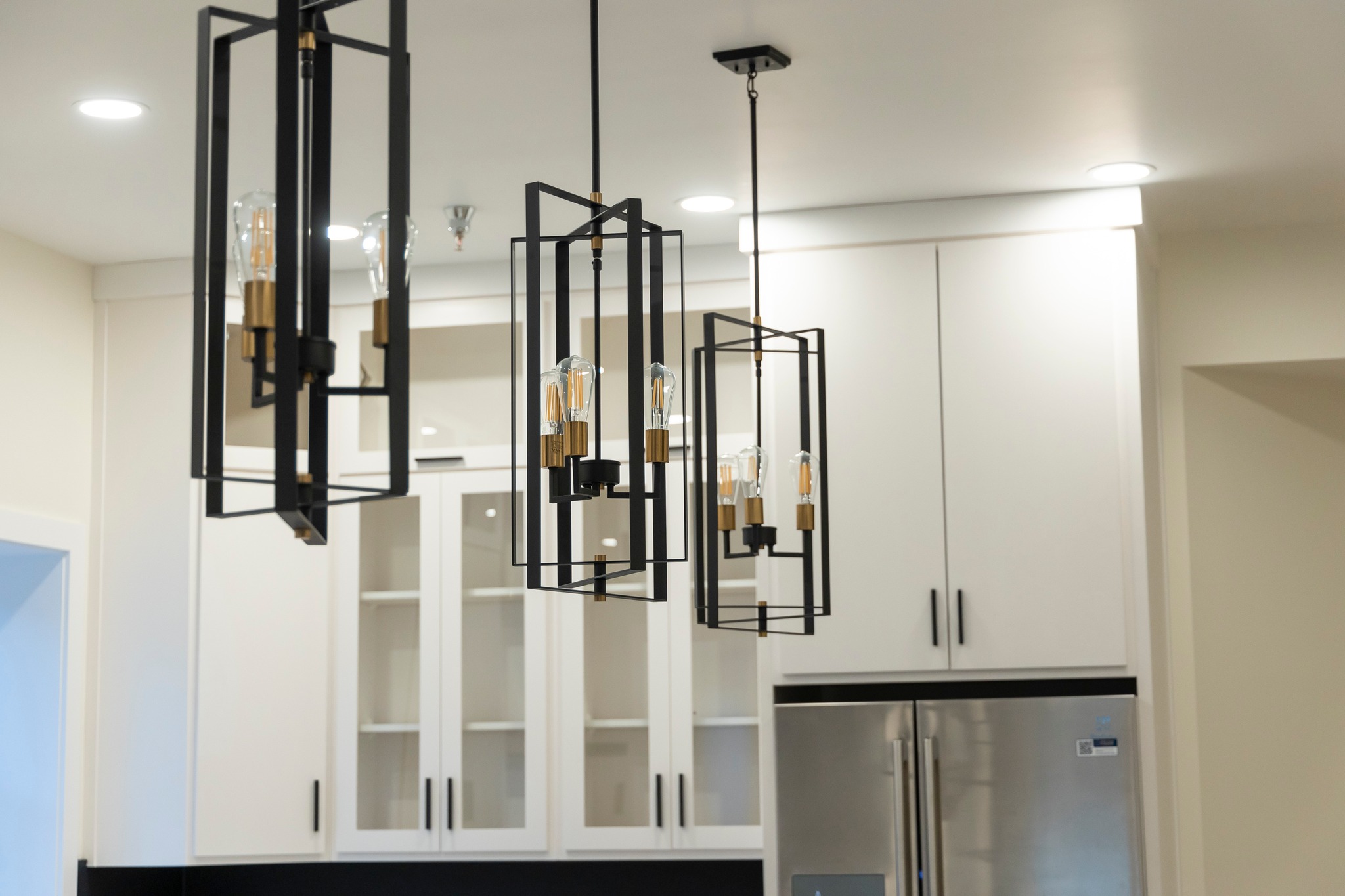 Three light fixtures installed in a downtown loft remodel in Sioux Falls, SD.