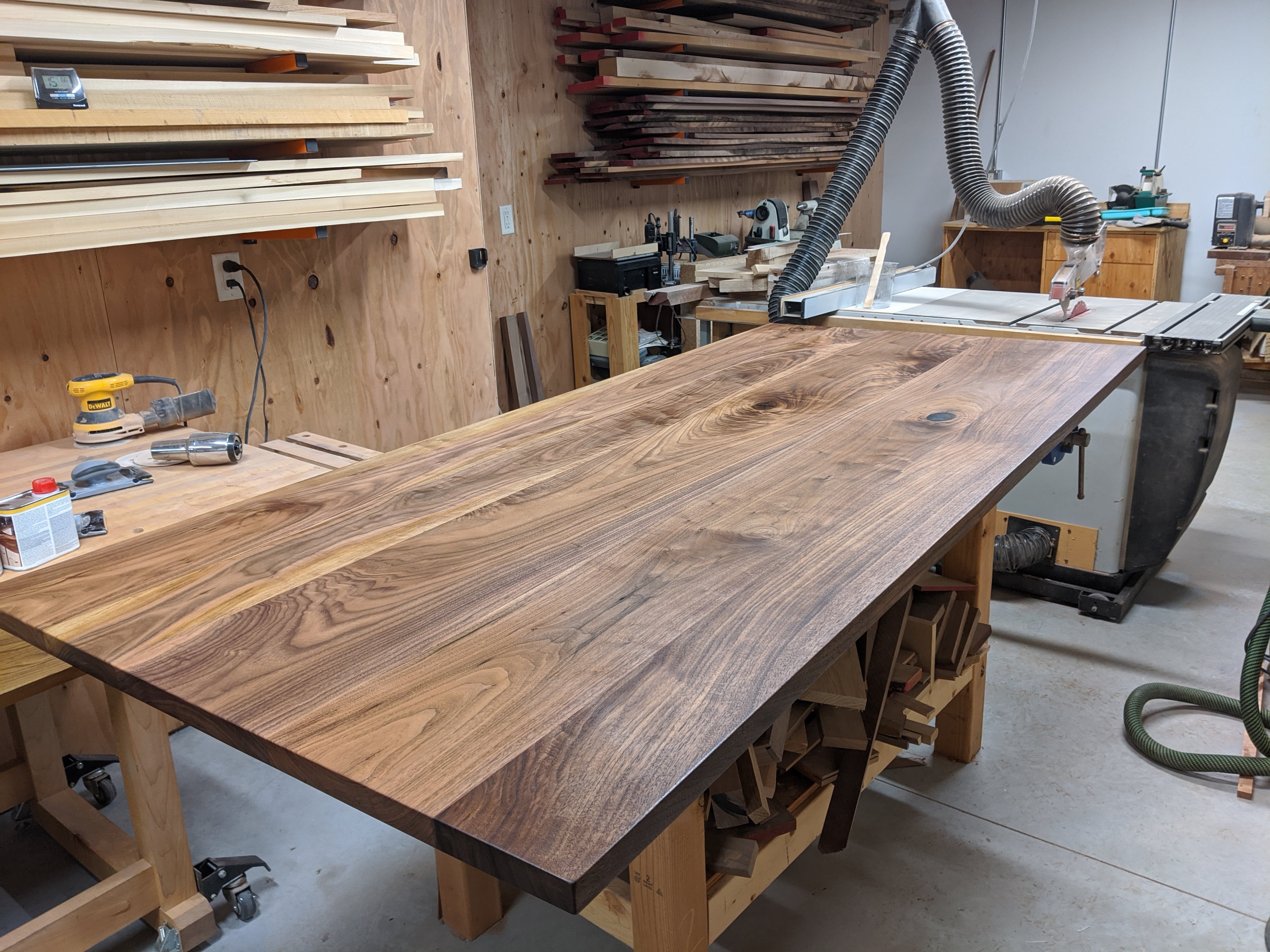 A custom black walnut kitchen island top built by OdeCo Custom Furniture in Brandon, SD.