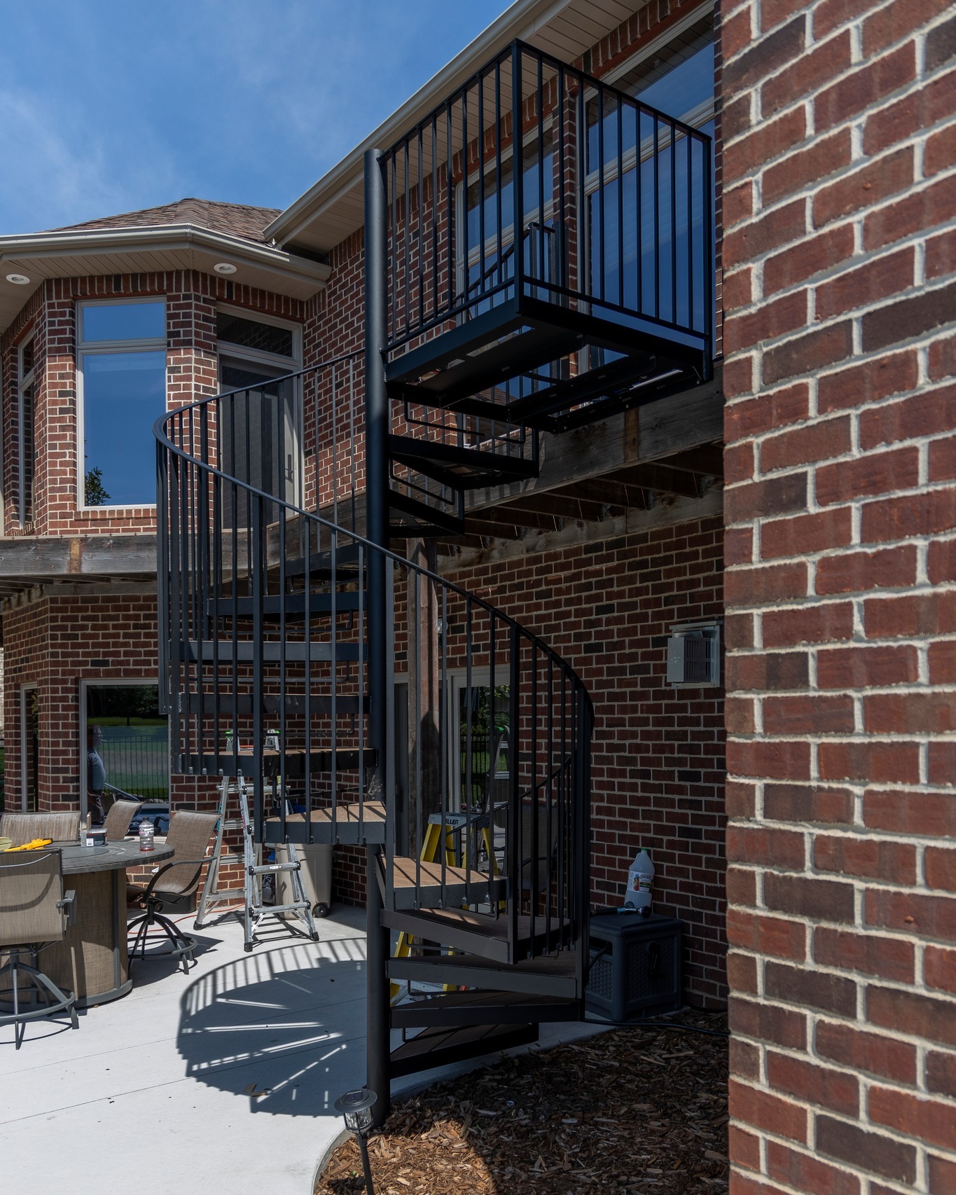 Circular stair added to an existing deck.