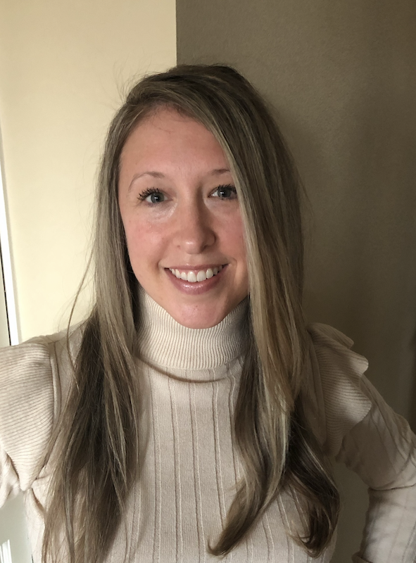 Erin Magoon smiling in a cream turtleneck, telehealth-only therapist for adolescents and adults at Grow Wellness Group
