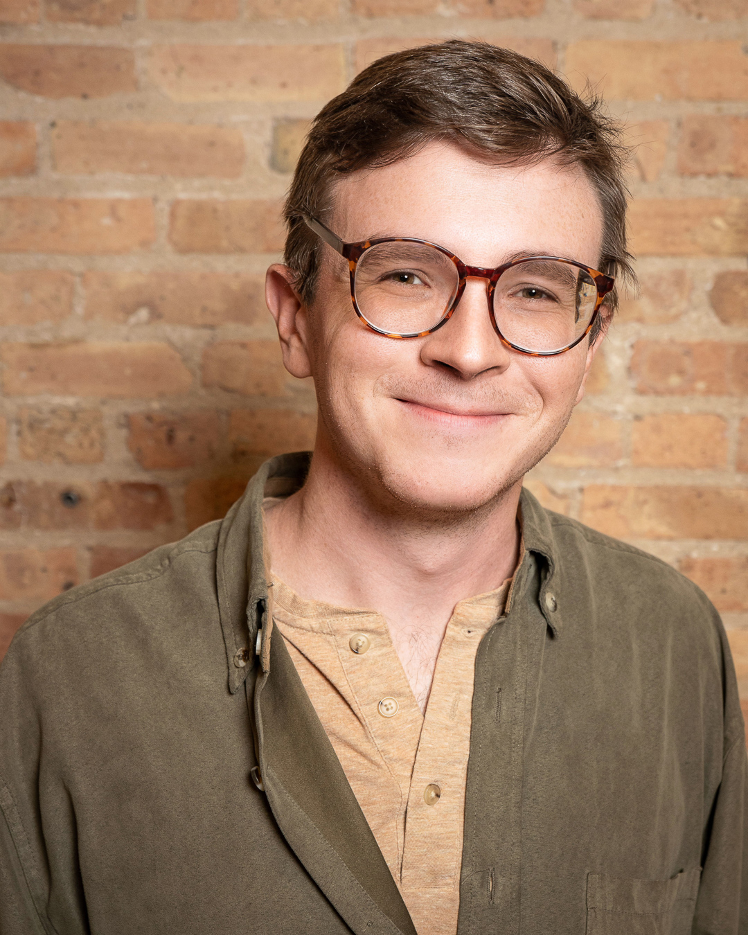 Connor Brown headshot who is a male teen therapist in Naperviile and is an experienced counselor specializing in helping teen male and female clients with emotional regulation, anxiety, relationship issues, grief, substance abuse and more.