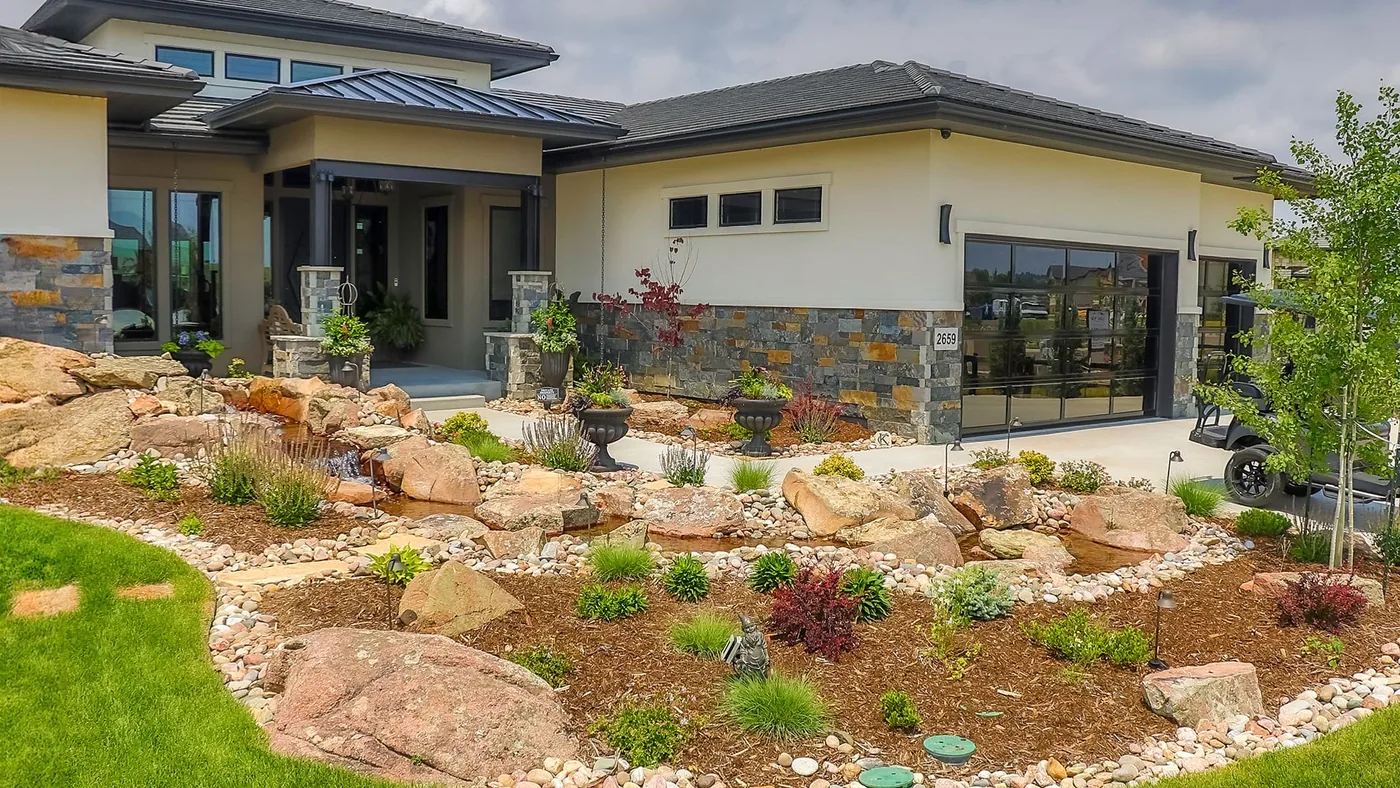 Planting design with layered shrubs and seasonal colour