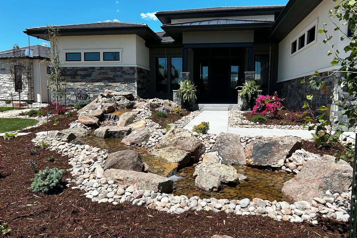Custom water feature and stonework built by Belmire