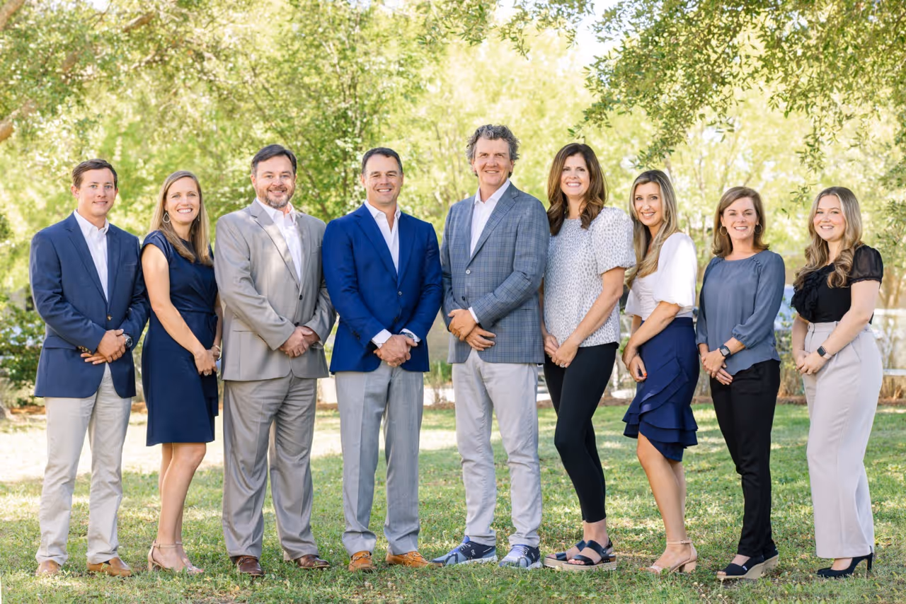 Group Formal Photograph of the Oswald Cooke Team