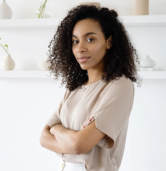 Woman with her arms crossed.