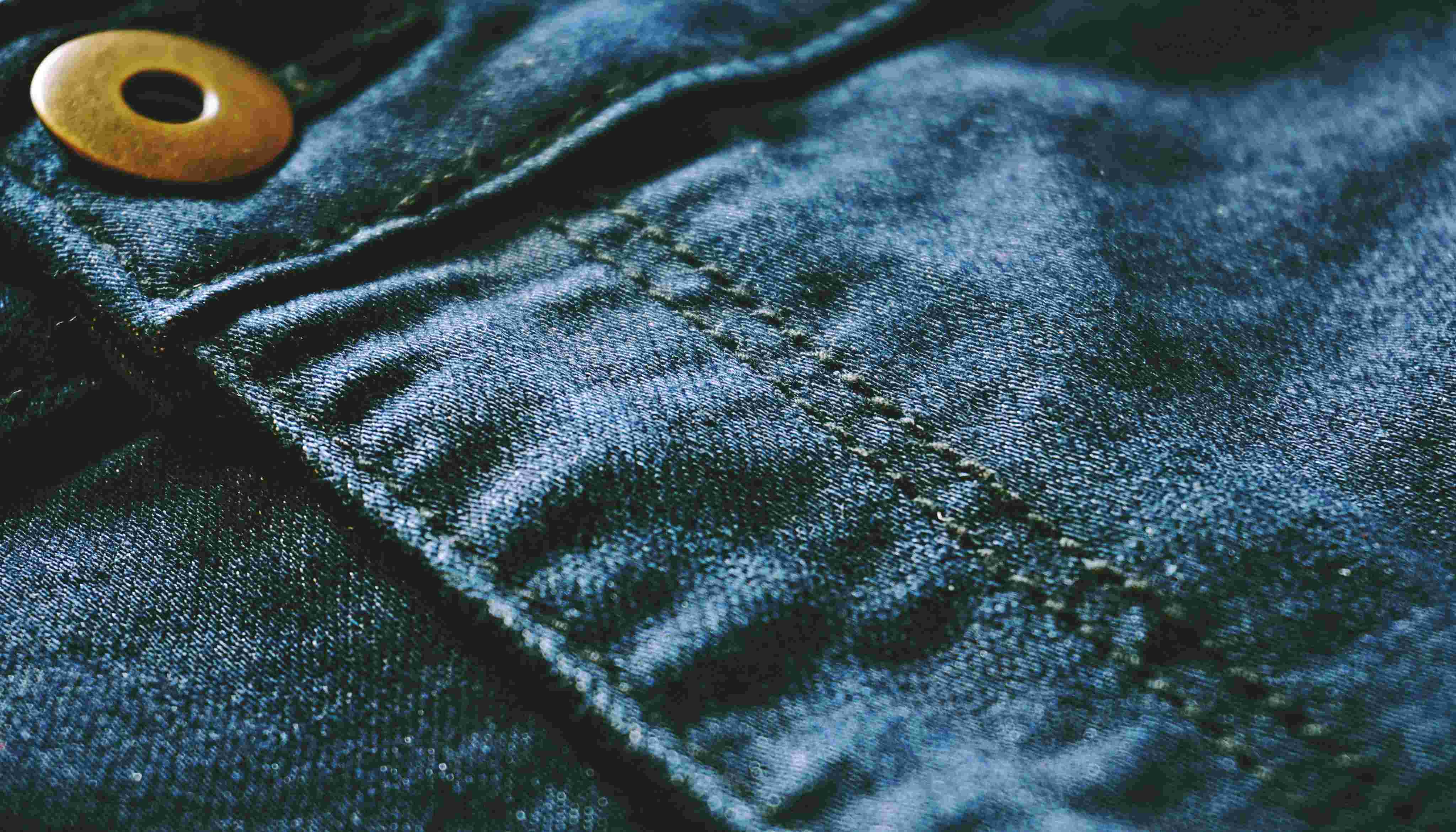 Blue Denim Textile With Brown Button