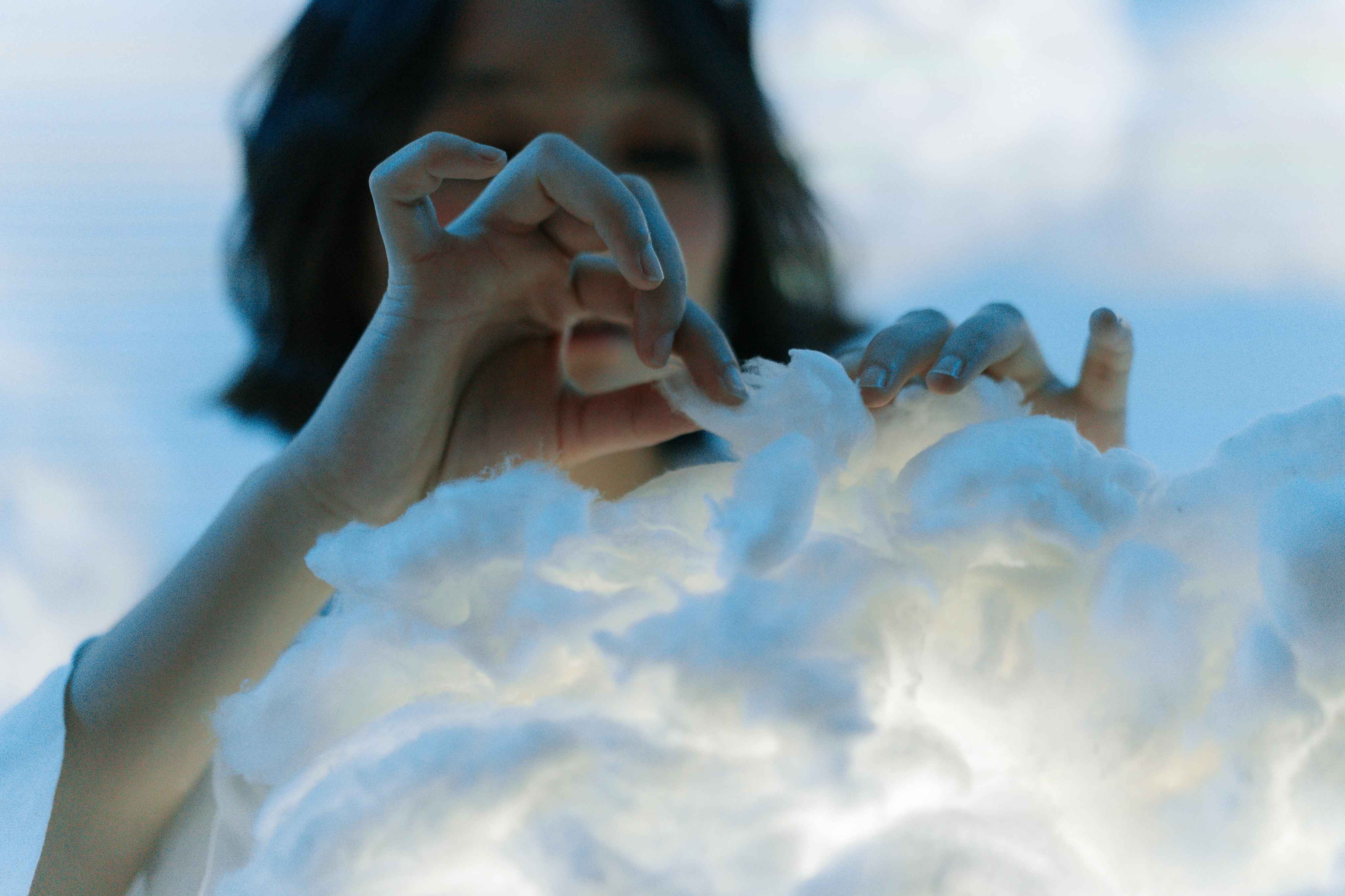 Woman Holding a Cotton