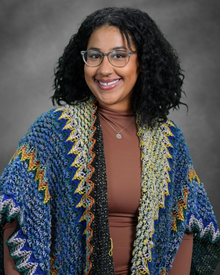Ms. Erianne Cruz smiling in a professional staff portrait