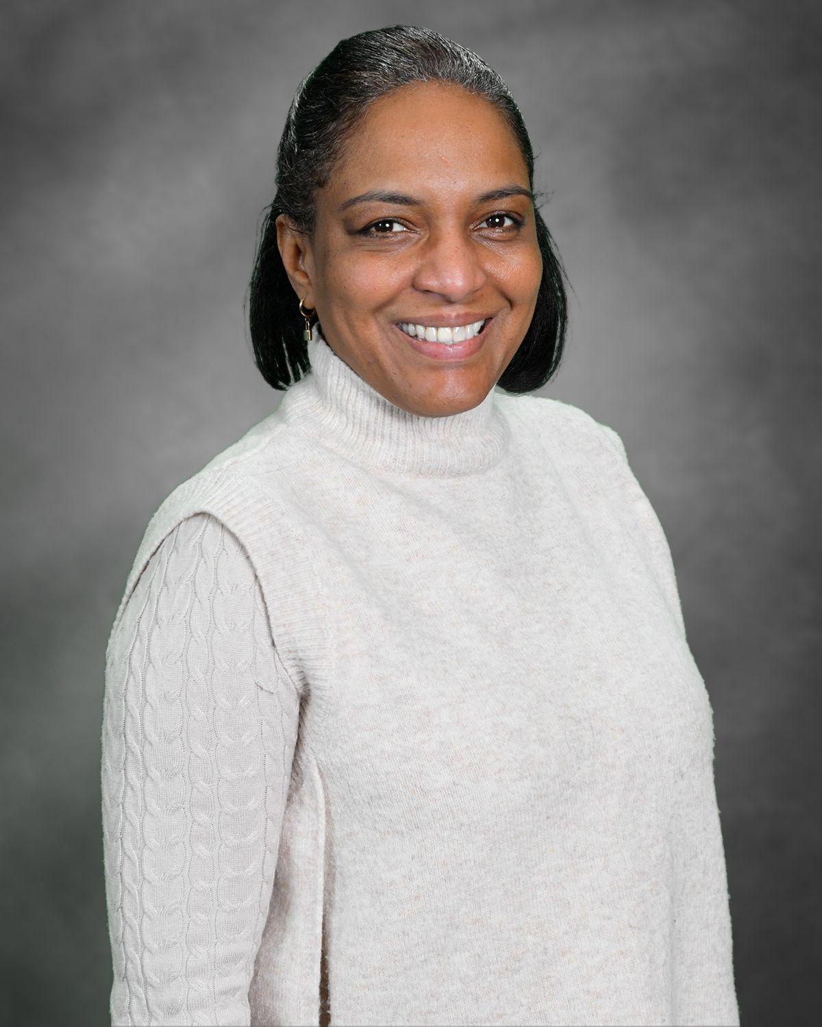 Ms. Elin Nunez staff member portrait photo smiling