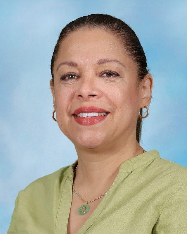 Ms. Gianilda Abreu smiling in staff directory photo