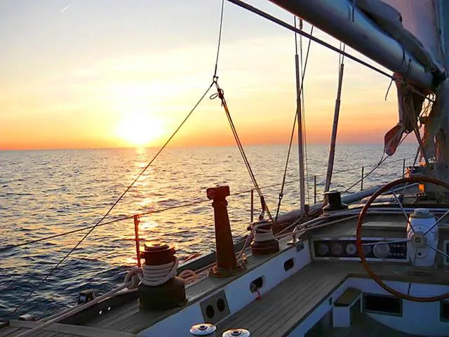 Sailboat deck at sunset