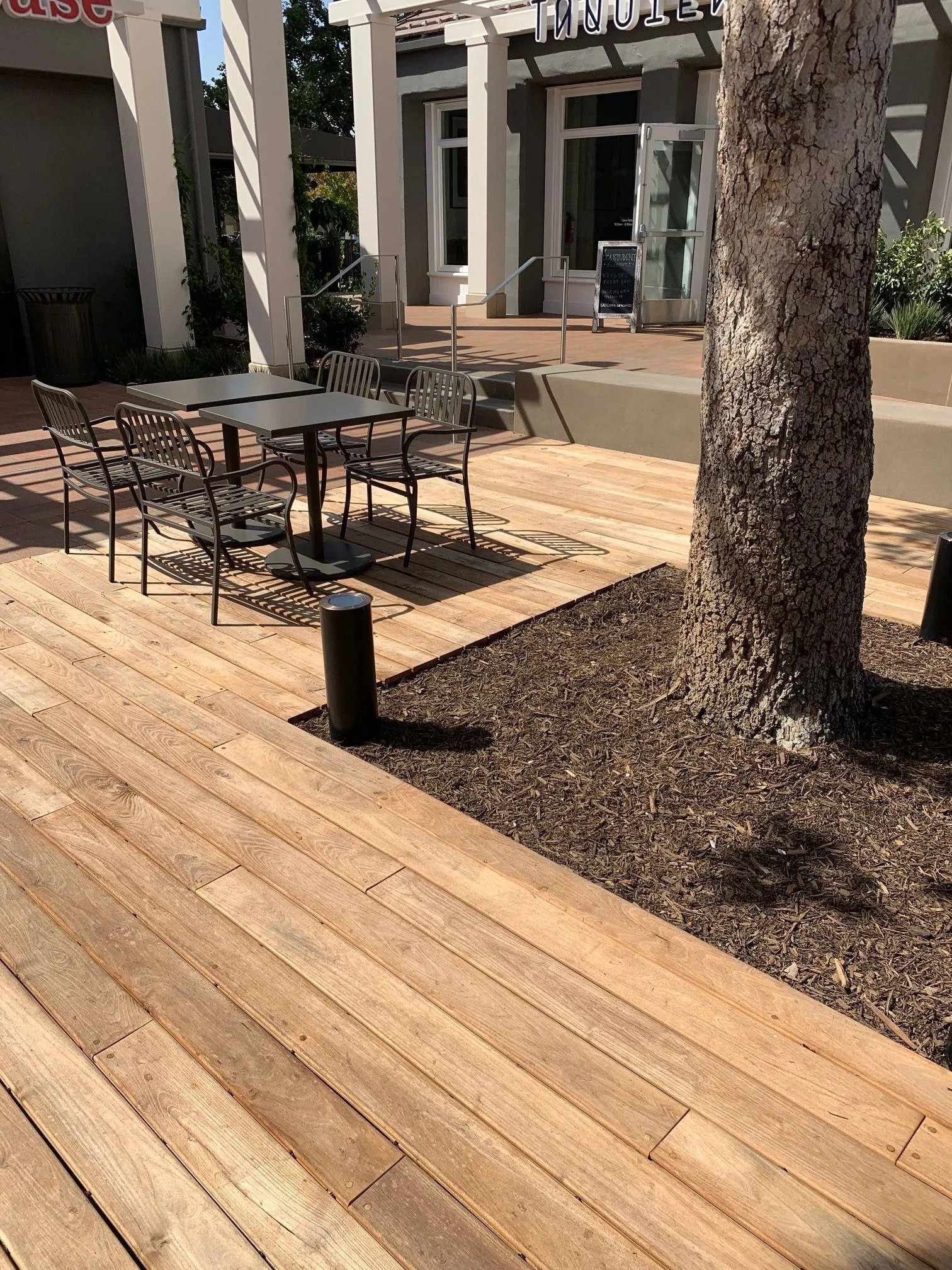 Outdoor restaurant patio with wooden decking