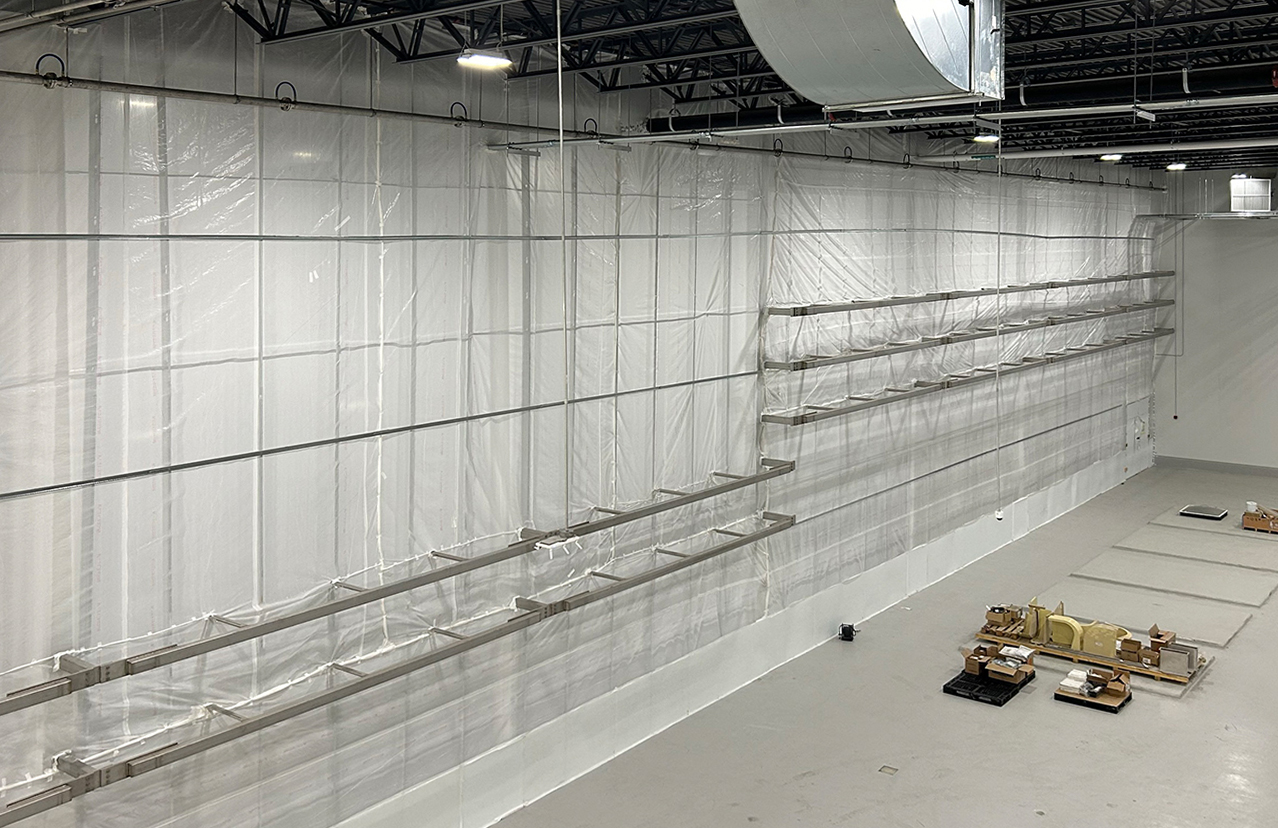 Framed Wall Containment Installation