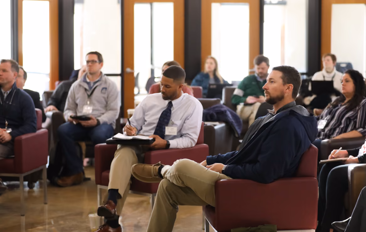 People sitting while listening to a lecture