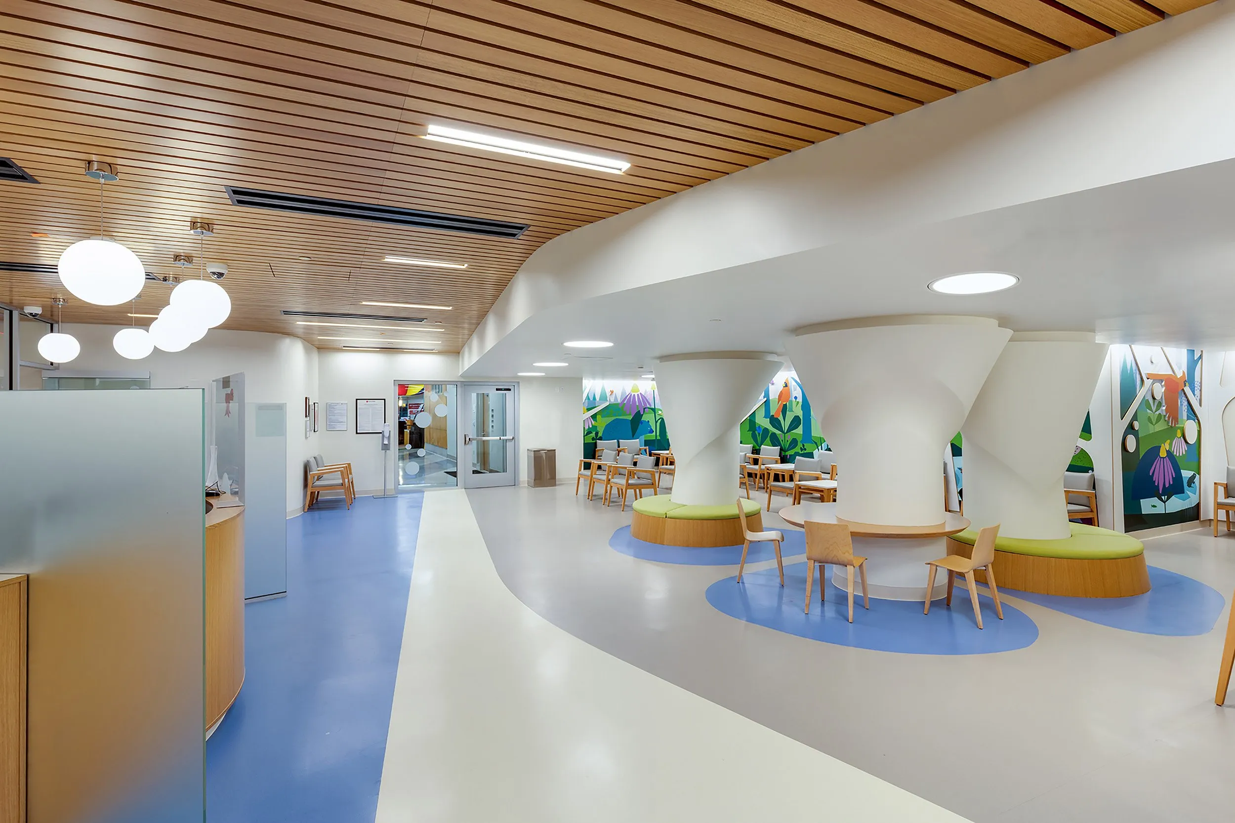 UH Pediatric Multispecialty Clinic interior design, custom wayfinding and furniture selection.