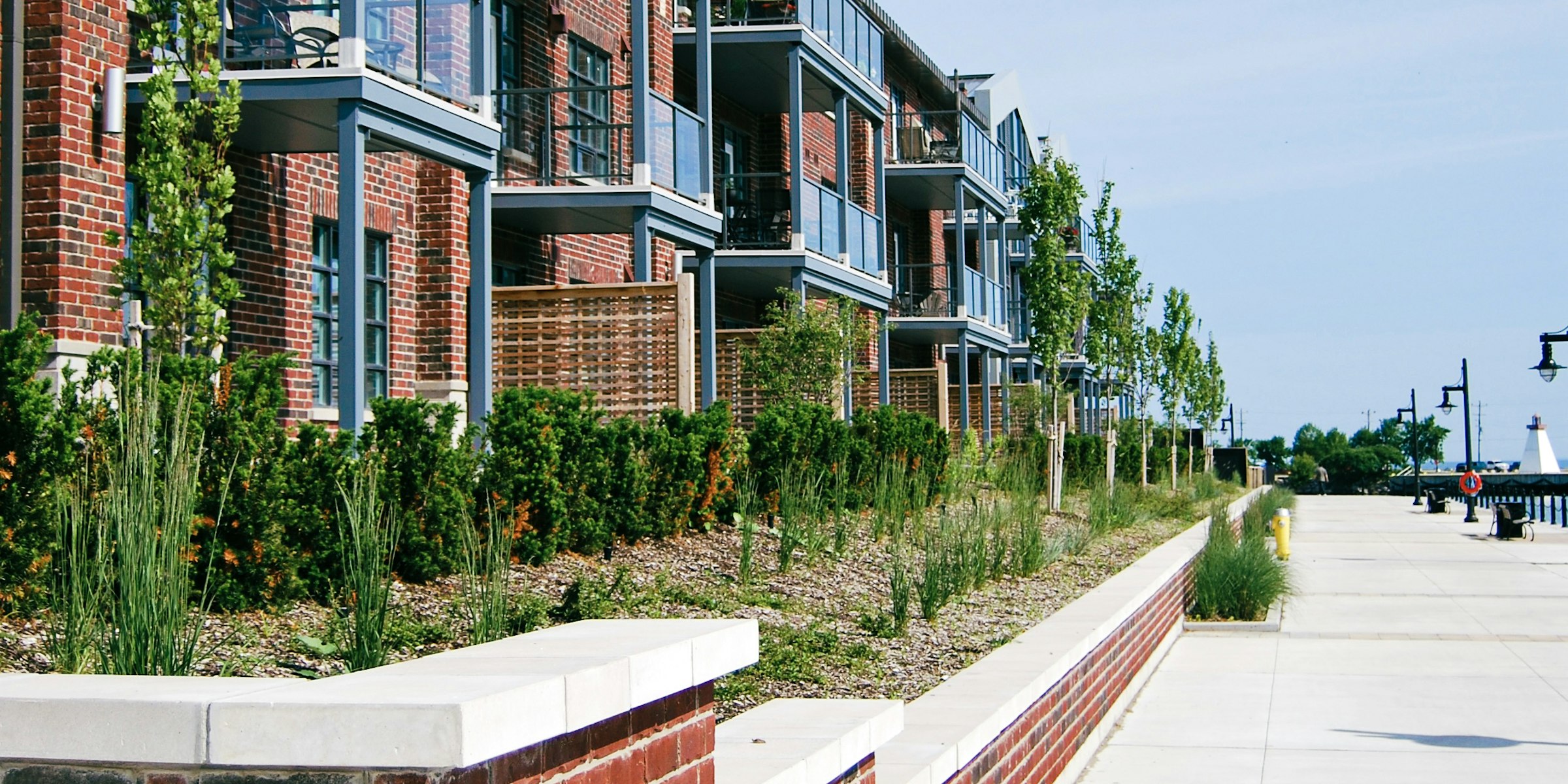 Brick multifamily apartment building with balconies