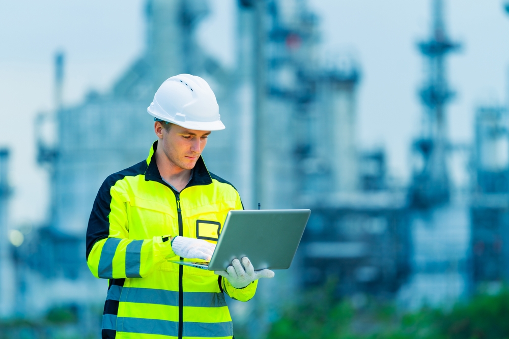 Energy worker using a laptop