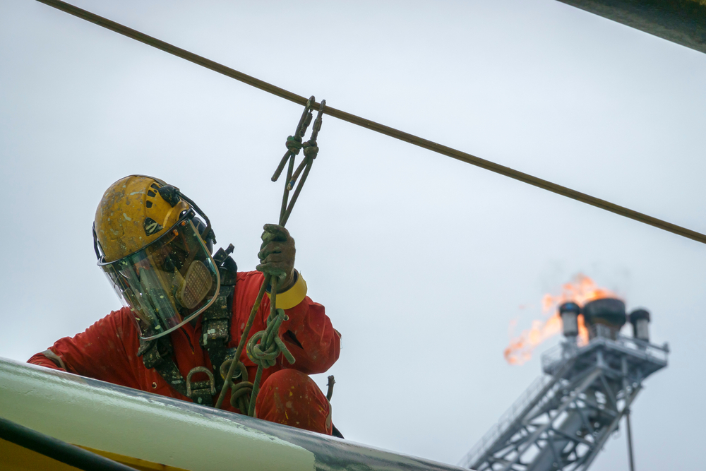Oil and gas worker wearing protective equipment