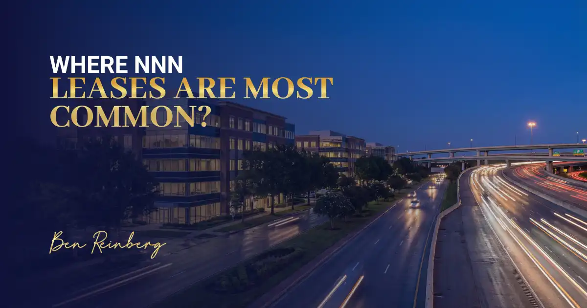 Modern commercial real estate design with urban office buildings and highway lights.