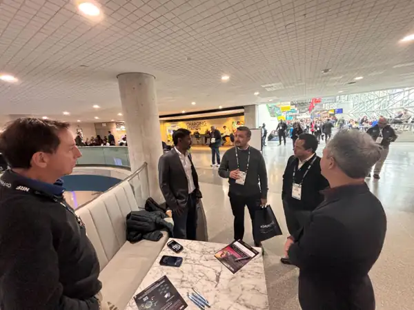 A standing meeting on the concourse