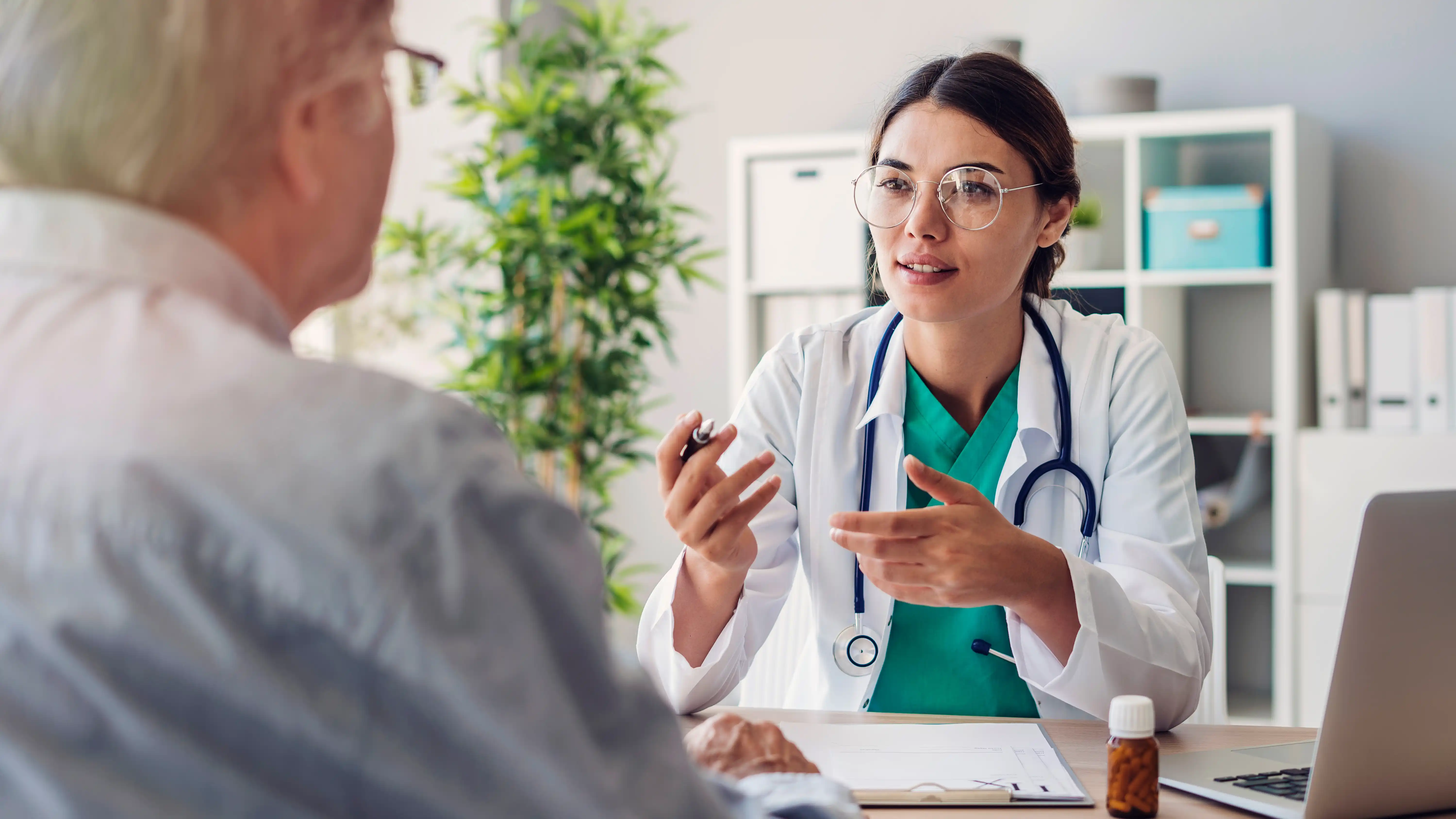 physician and patient discuss surgical preparedness before surgery