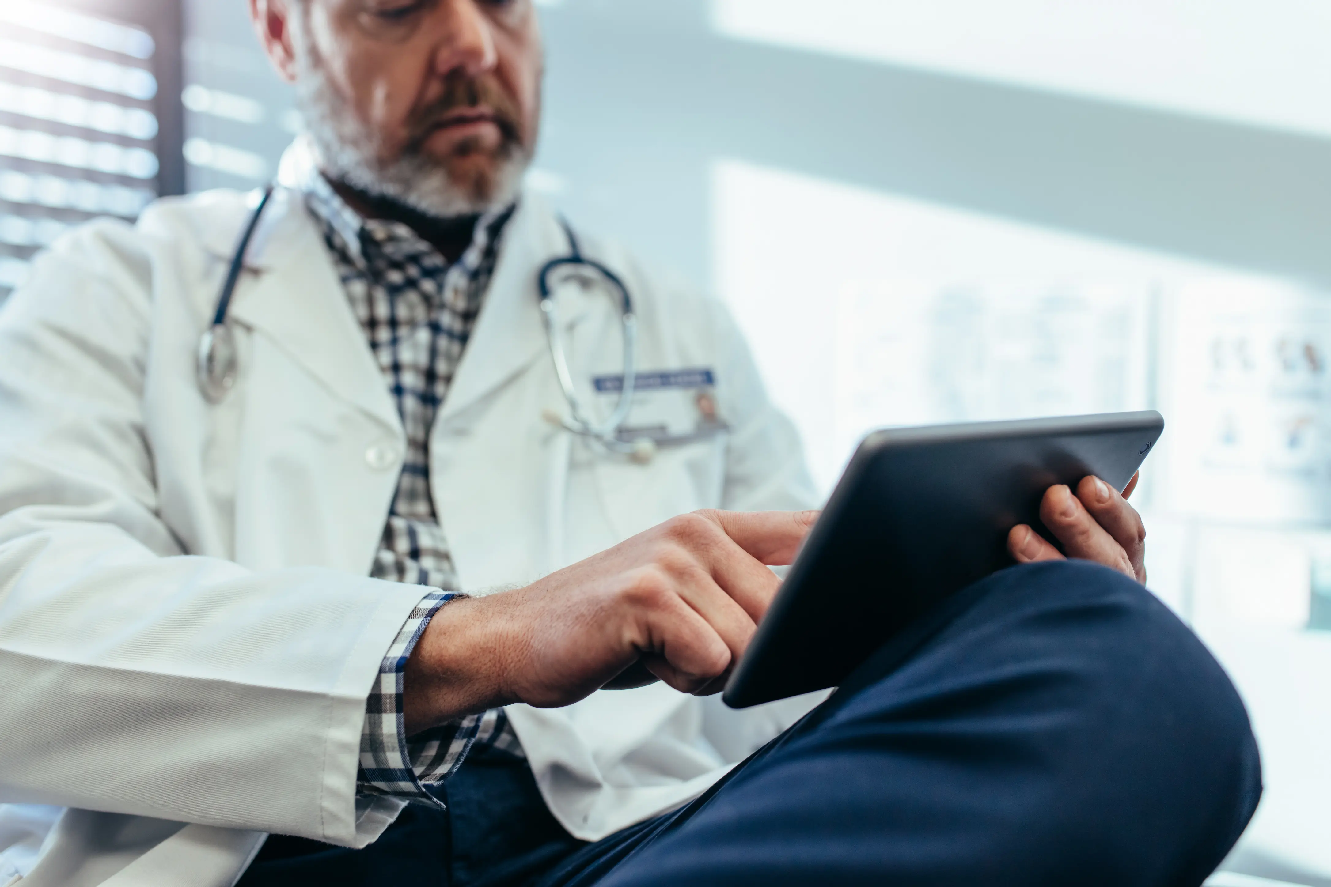 Clinician reviewing long-term patient engagement data in the Force Therapeutics tablet app