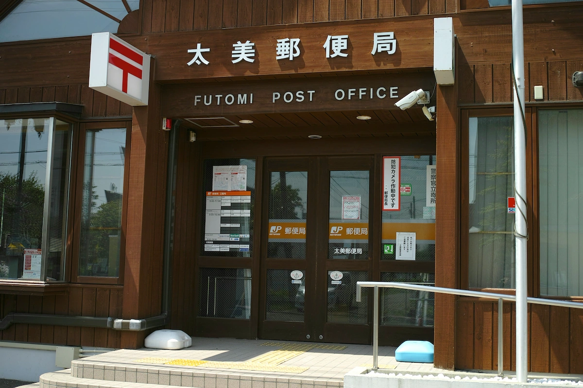 Customer at post office counter